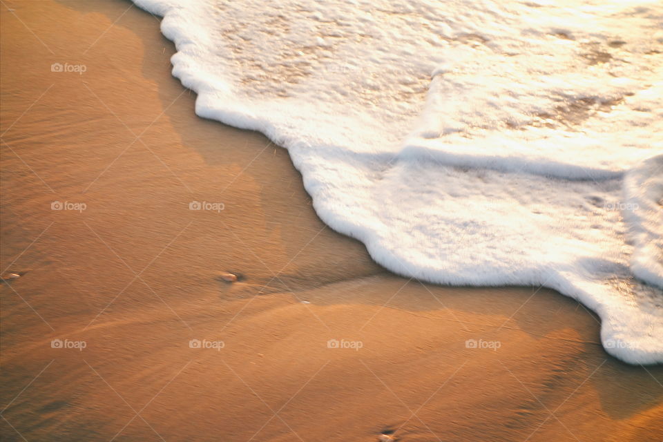 wave and sand