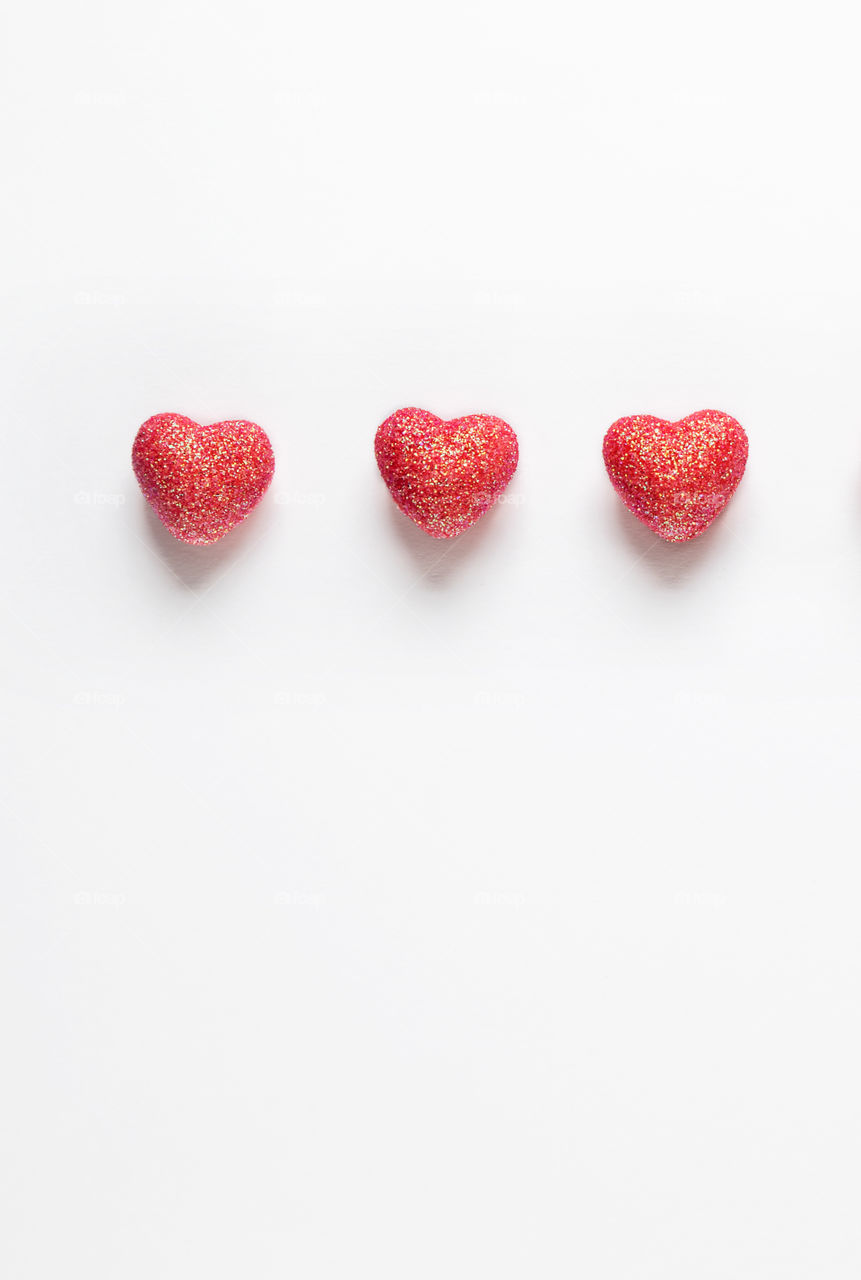 Postcard. Red hearts on a white background. Valentine's Day.