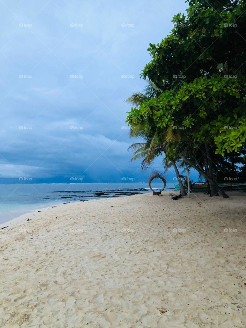 A beach and a huge ring