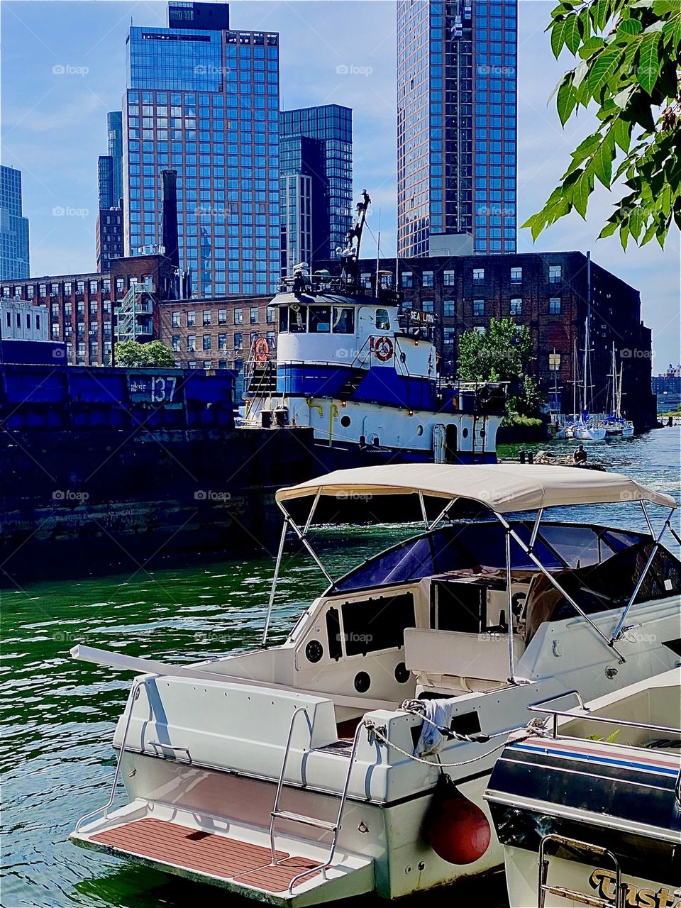 The wheelhouse of an enormously large barge is now definitely approaching us on the “East River” at “Newtown Creek” by the “Pulaski Bridge” in LIC, Queens on a warm sunny Indian summer afternoon in September 2023. Hypnotic Productions