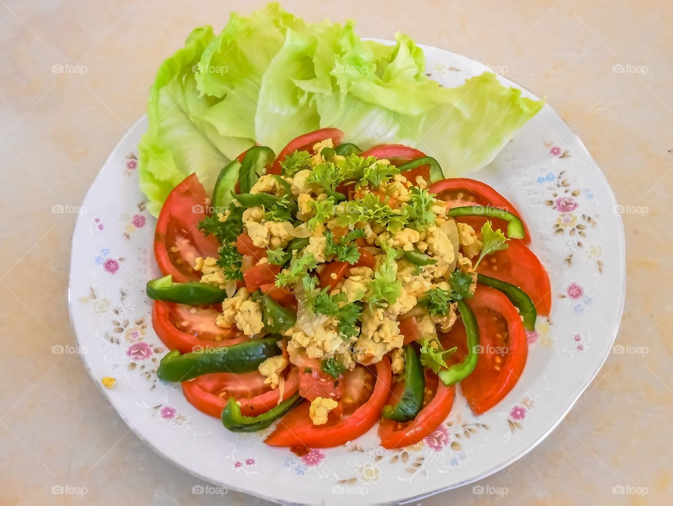 Scramble Eggs And Vegetables On Plate