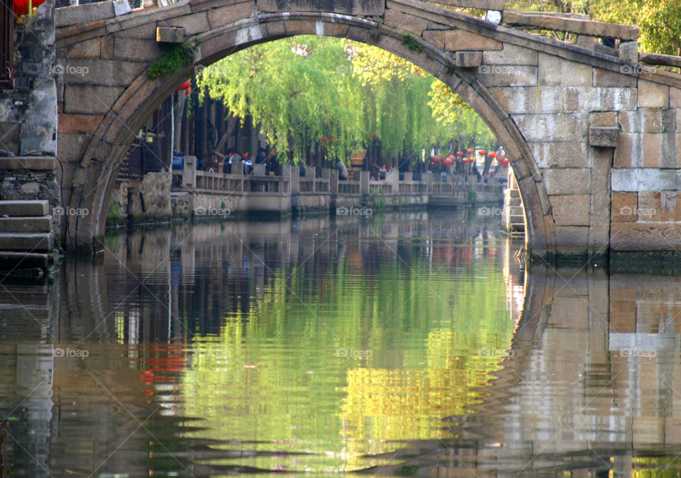 Bridge crossing canal.