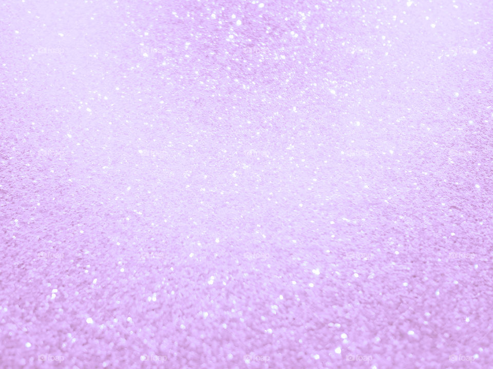 Purple violet glitter texture background. Concept for New Year, Valentines, Christmas, Wedding Anniversary, and Celebration background.