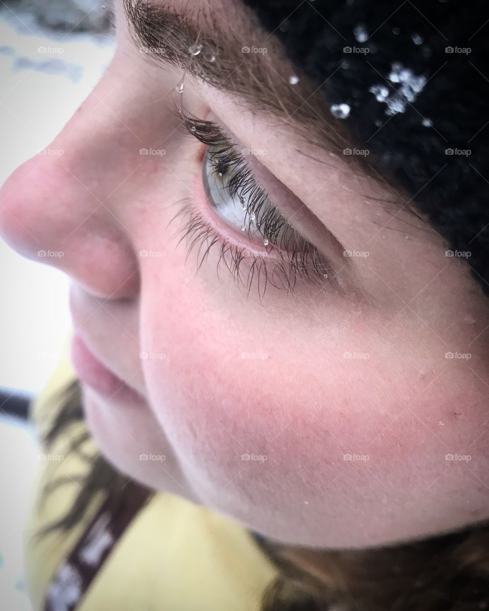 Snow falling on the face of someone seeing snow for the first time!