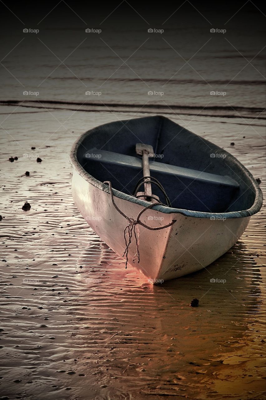 Boat moored at beach