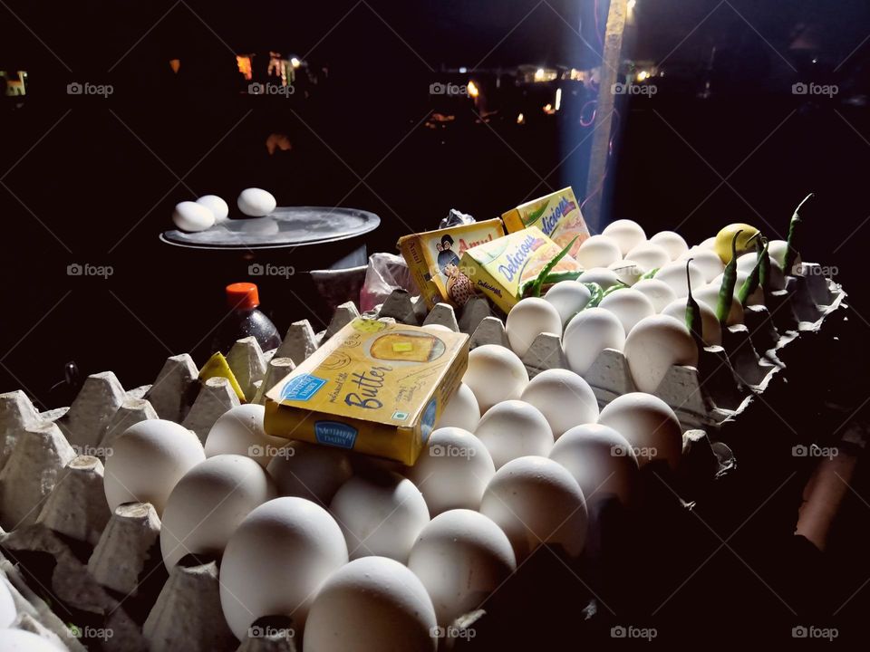 egg trays with butter and chilli to make omelet.