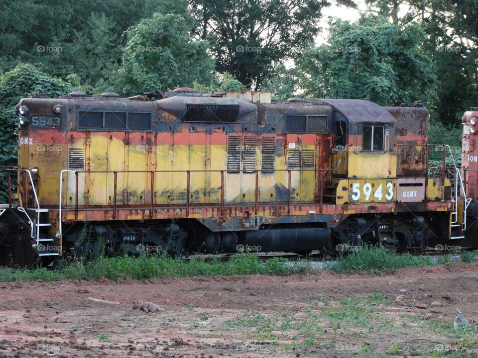 old abandoned rusty broken train locomotive