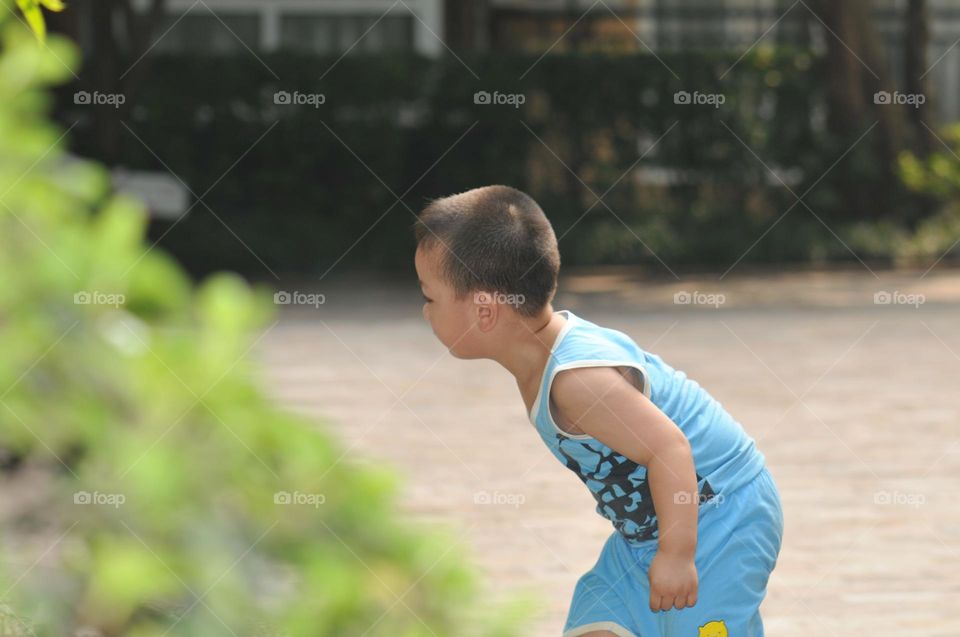 A curious and happy little boy.