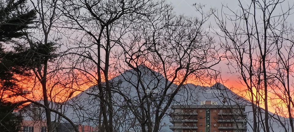 sunset behind the mountain