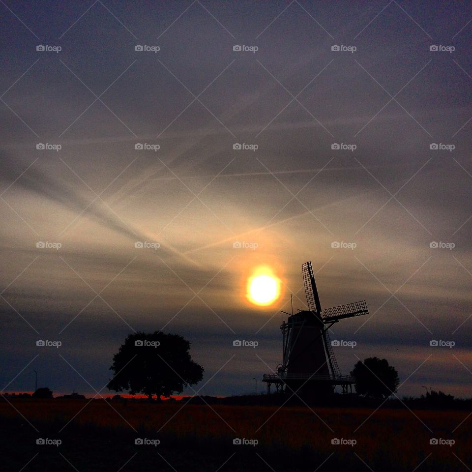 Sunset Windmill . Windmill in The Netherlands