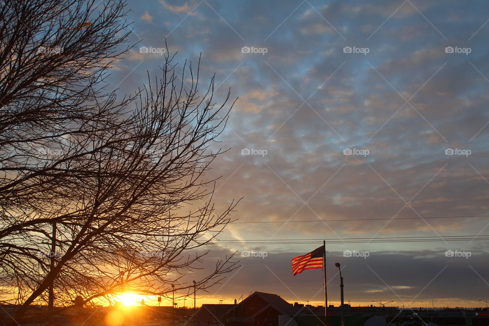 Stunning sunset in Nebraska with American flag