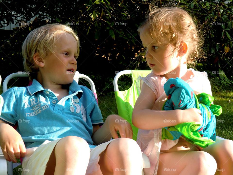 Siblings having a chat