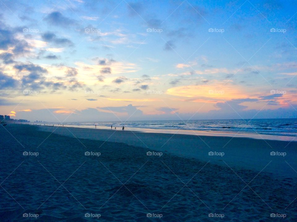 An early morning sunrise! I captured this photo while vacationing at Myrtle Beach, South Carolina. 