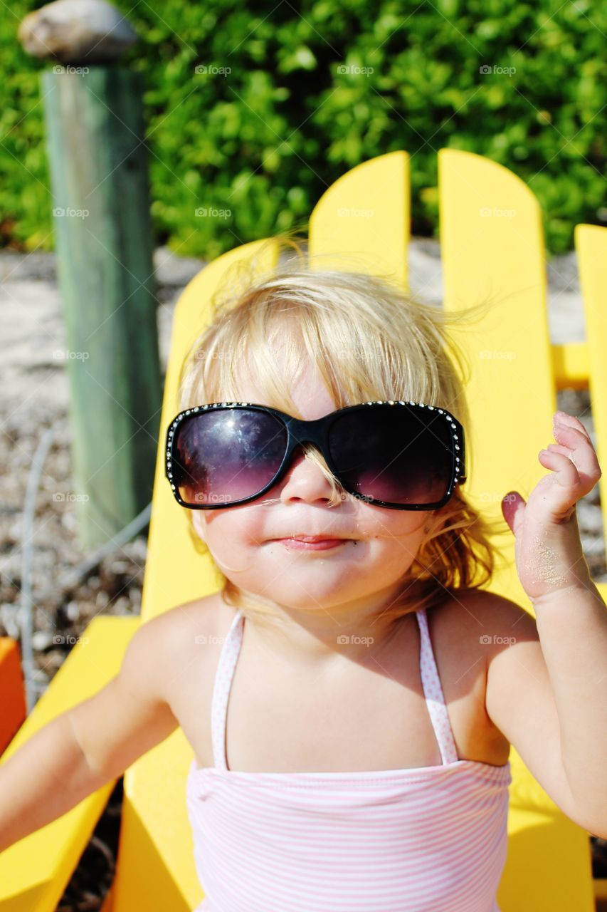 Portrait of cute girl wearing sunglasses