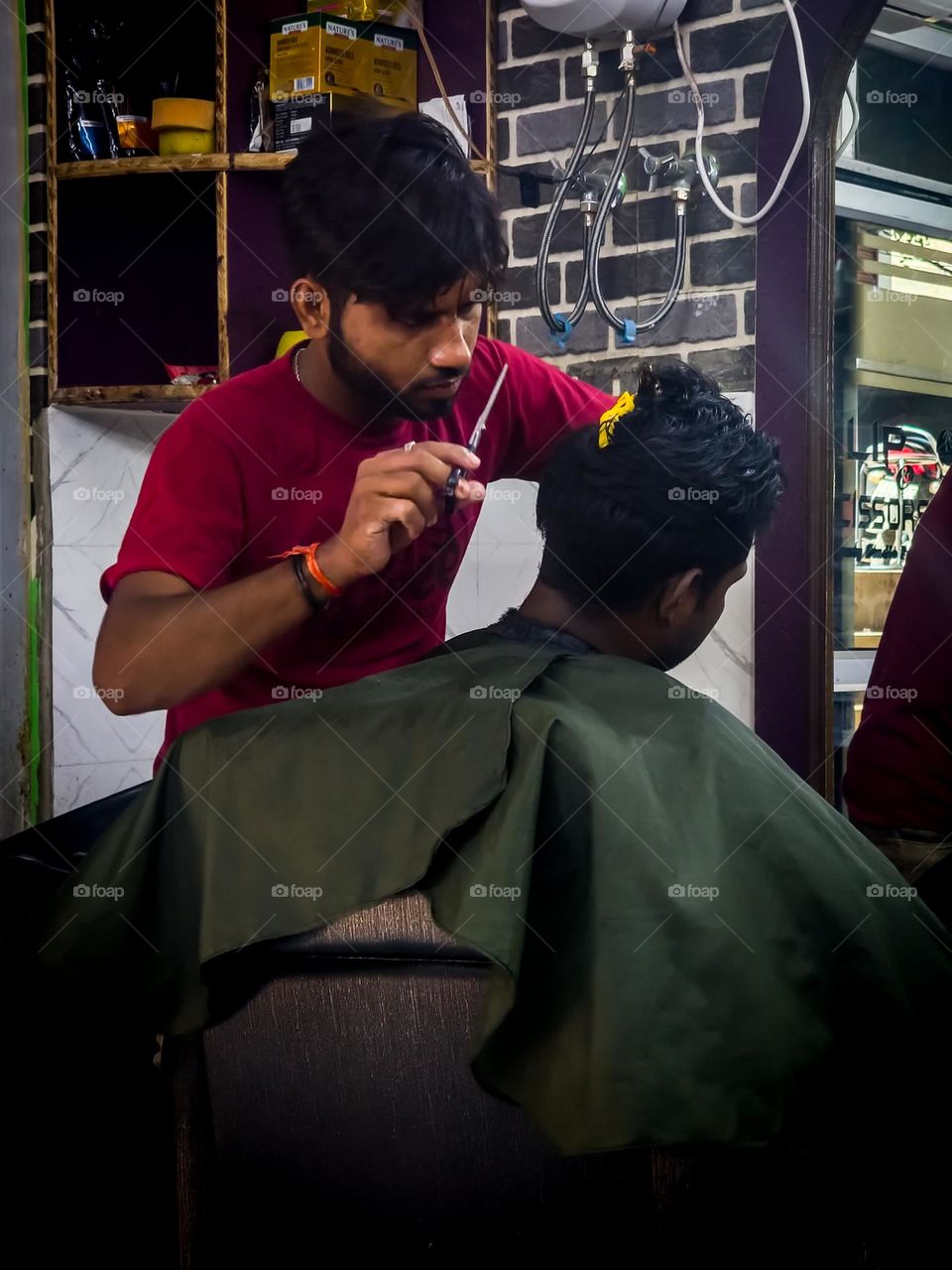 Indian Barber hairdressing client