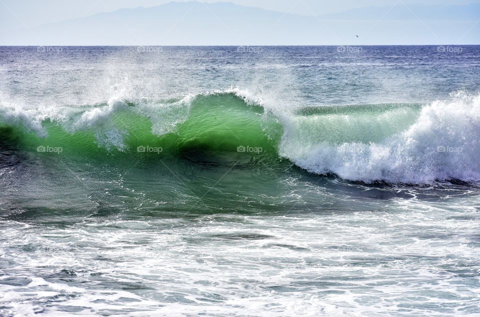 ocean waves on play del ingles beach on la gomera canary island in Spain