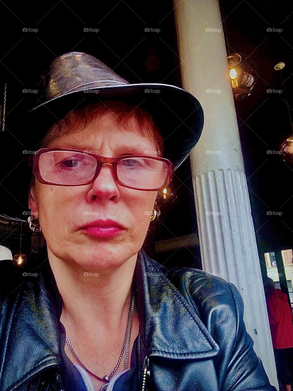 A portrait photograph taken somewhere in the vicinity of Brooklyn in an outdoor café. 2019. Hypnotic Productions