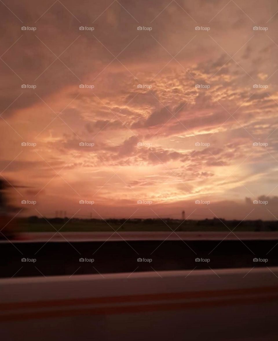 Heading to the airport✈️ with a Sunrise view on the highway.