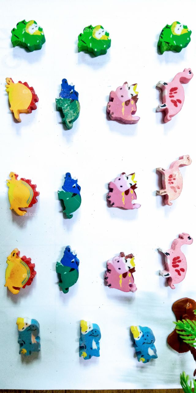 The different lovely colors and different kind of  cute eraser dinosaurs collection for kids
