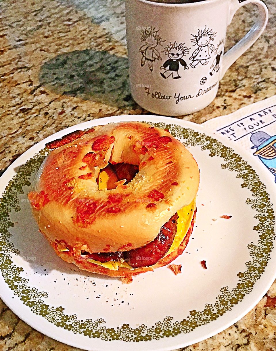 Southern sausage and egg with cheese on a toasted plain bagel. 