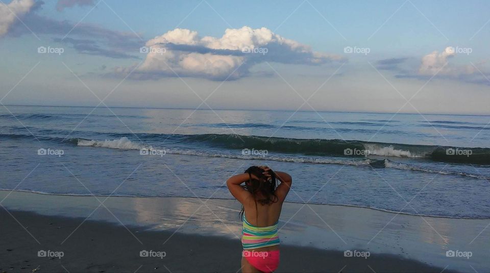 little girl on the each memories of summer vacation Atlantic Ocean