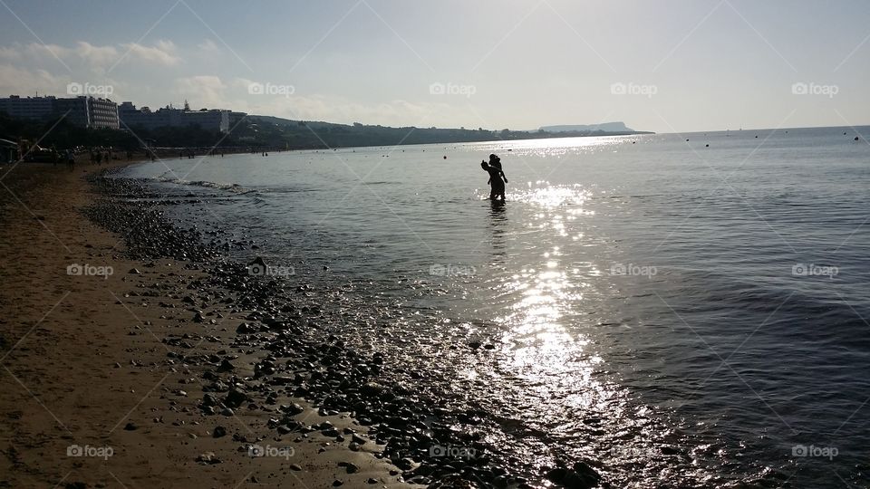 Couple having fun in the sea