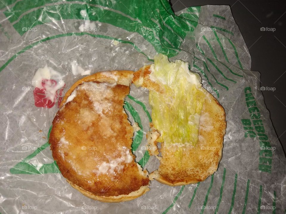 Insides of eaten chicken sandwich. Looking deeper into the food🔍👀.