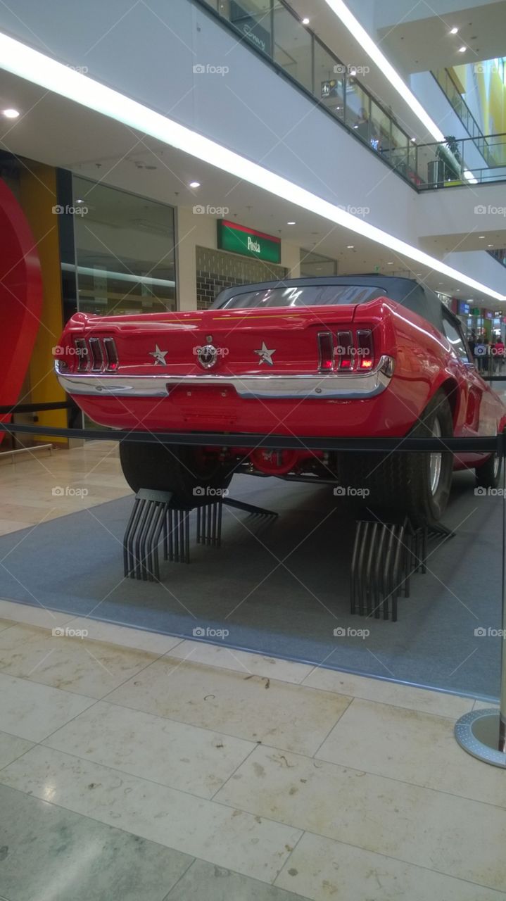 red mustang with big V8 motor