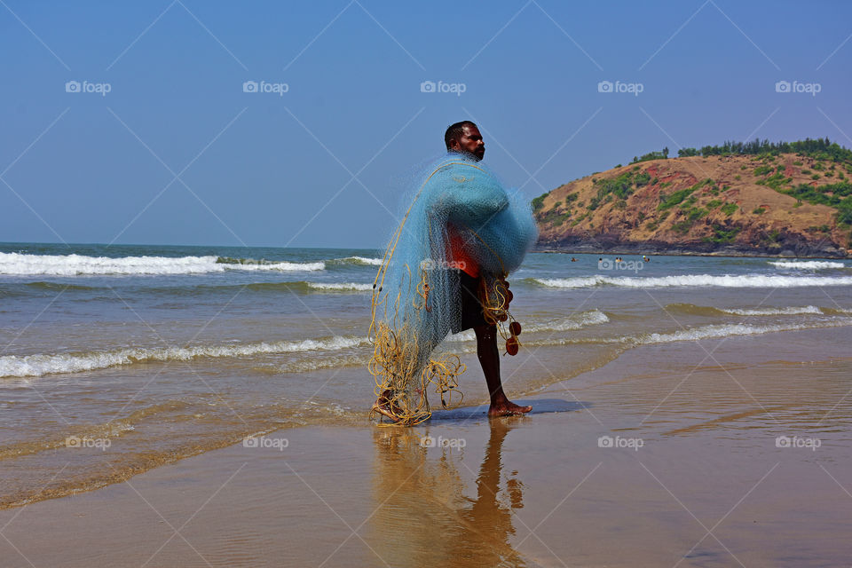 fisherman with his fishing net