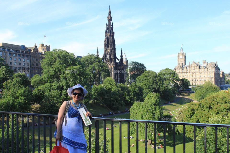 Woman standing near railing