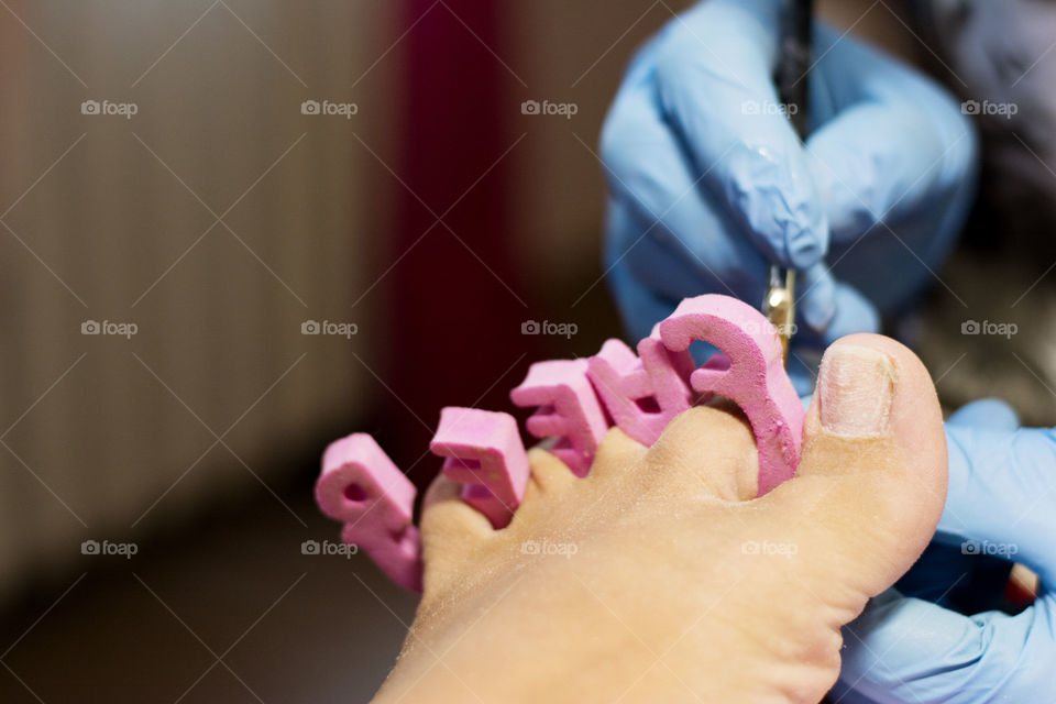 pedicure. woman feet having a pedicure treatment