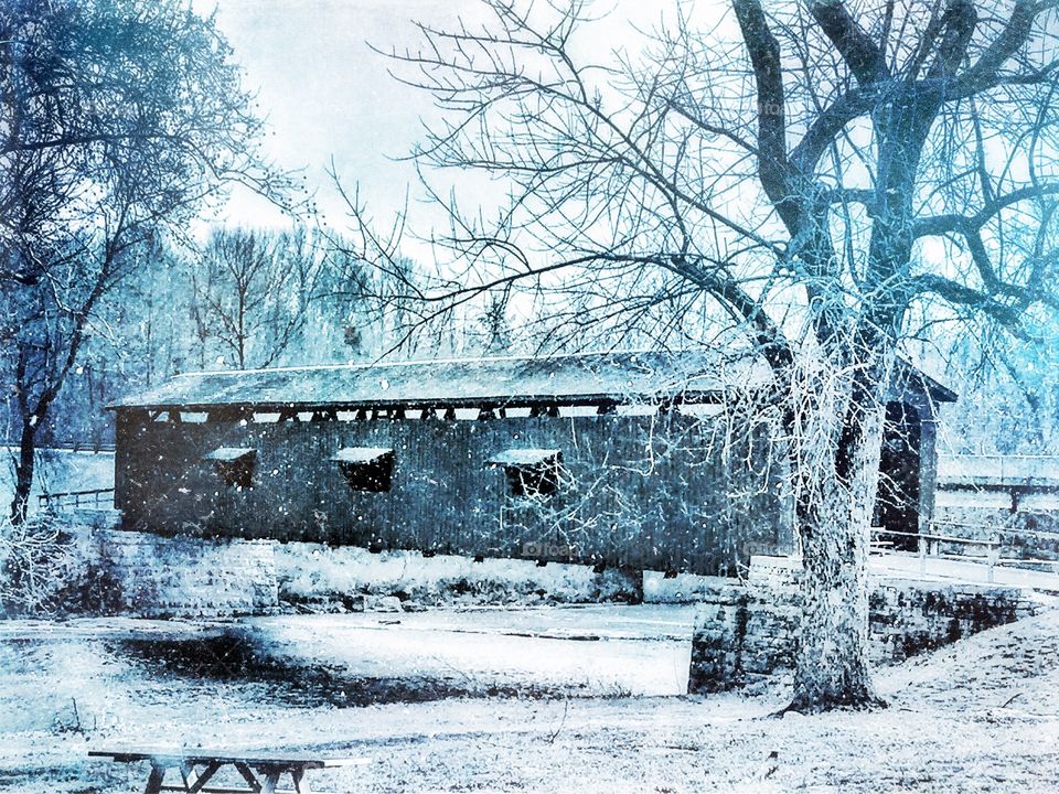 Old covered bridge in winter
