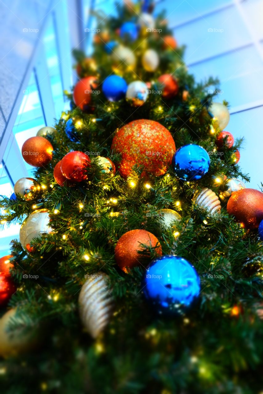 Christmas decorations, orange, blue and gold.