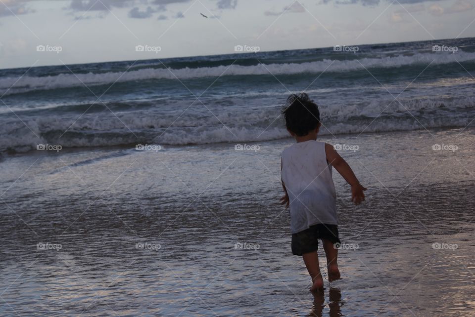 Child in the sea