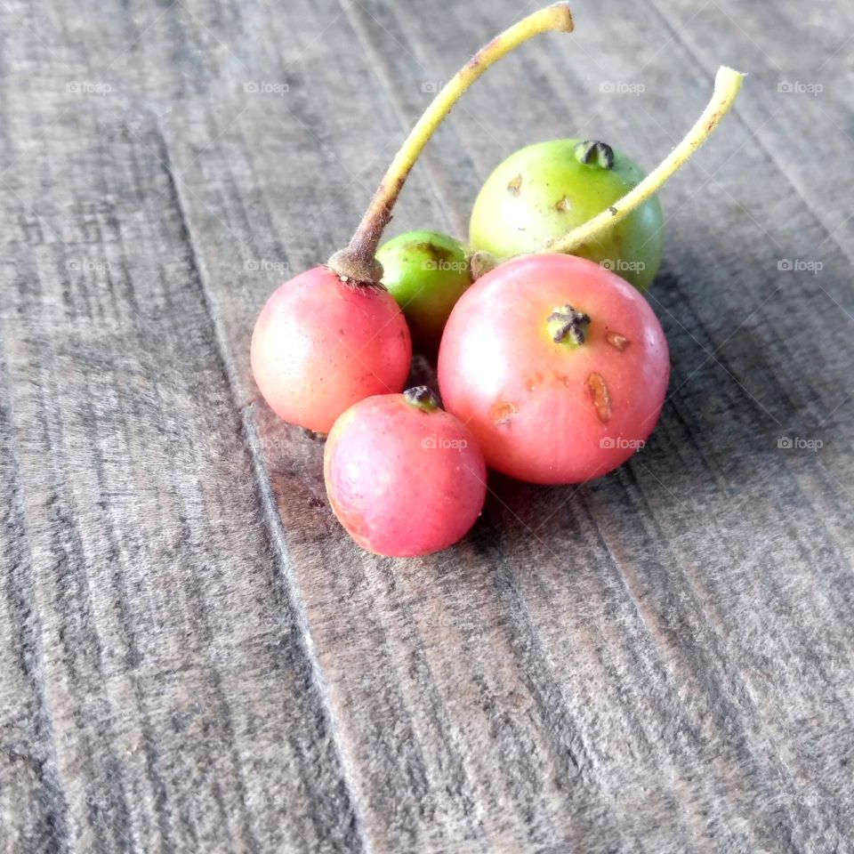 Fresh cherry fruits on the table