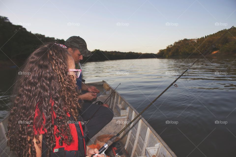 Daughter fishing with Dad