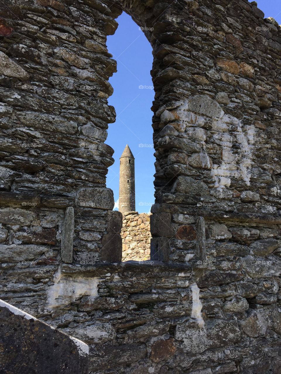 Glendalough . A monk's tower at Glendalough in County Wicklow, Ireland.