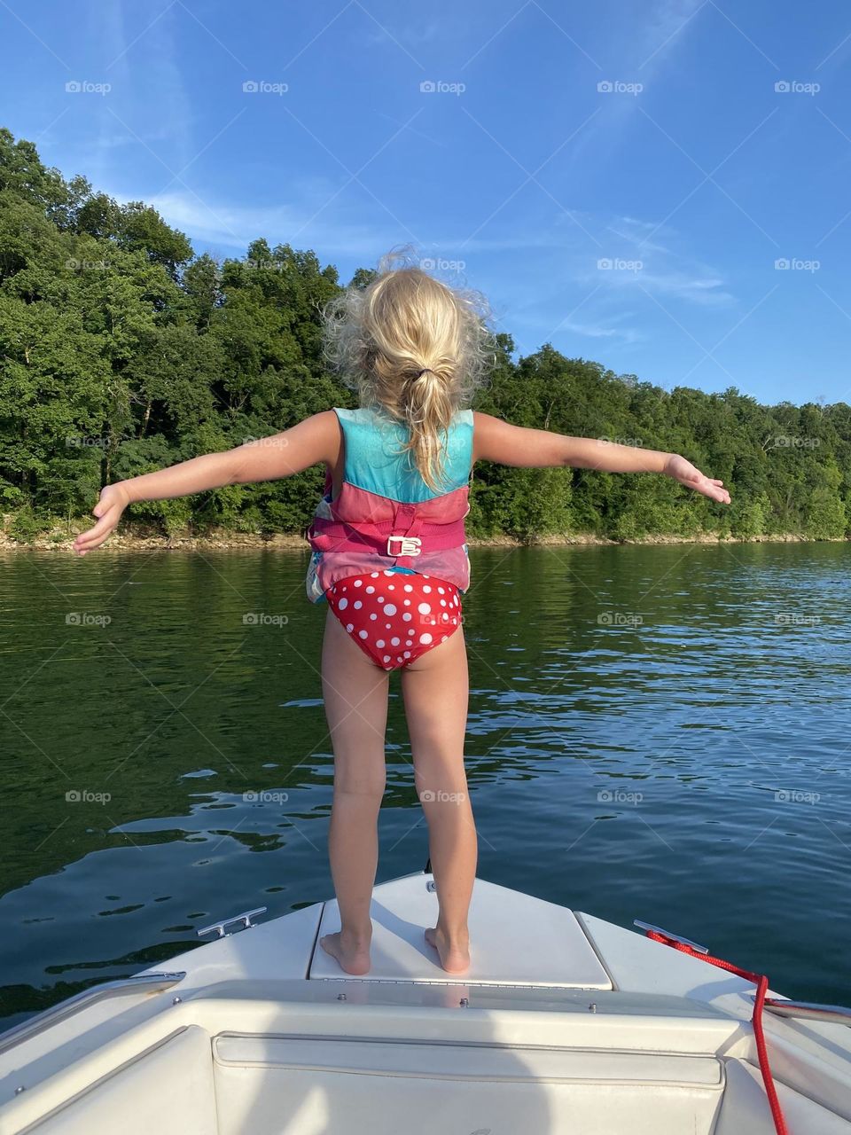 Living her best life on a hot summer day out on the lake in Kentucky 