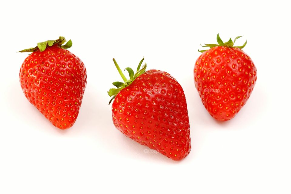 Three strawbwrries