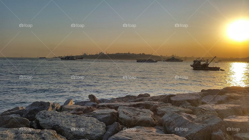 sunset in bosforo beach. coast of bosforo in istambul at sunset