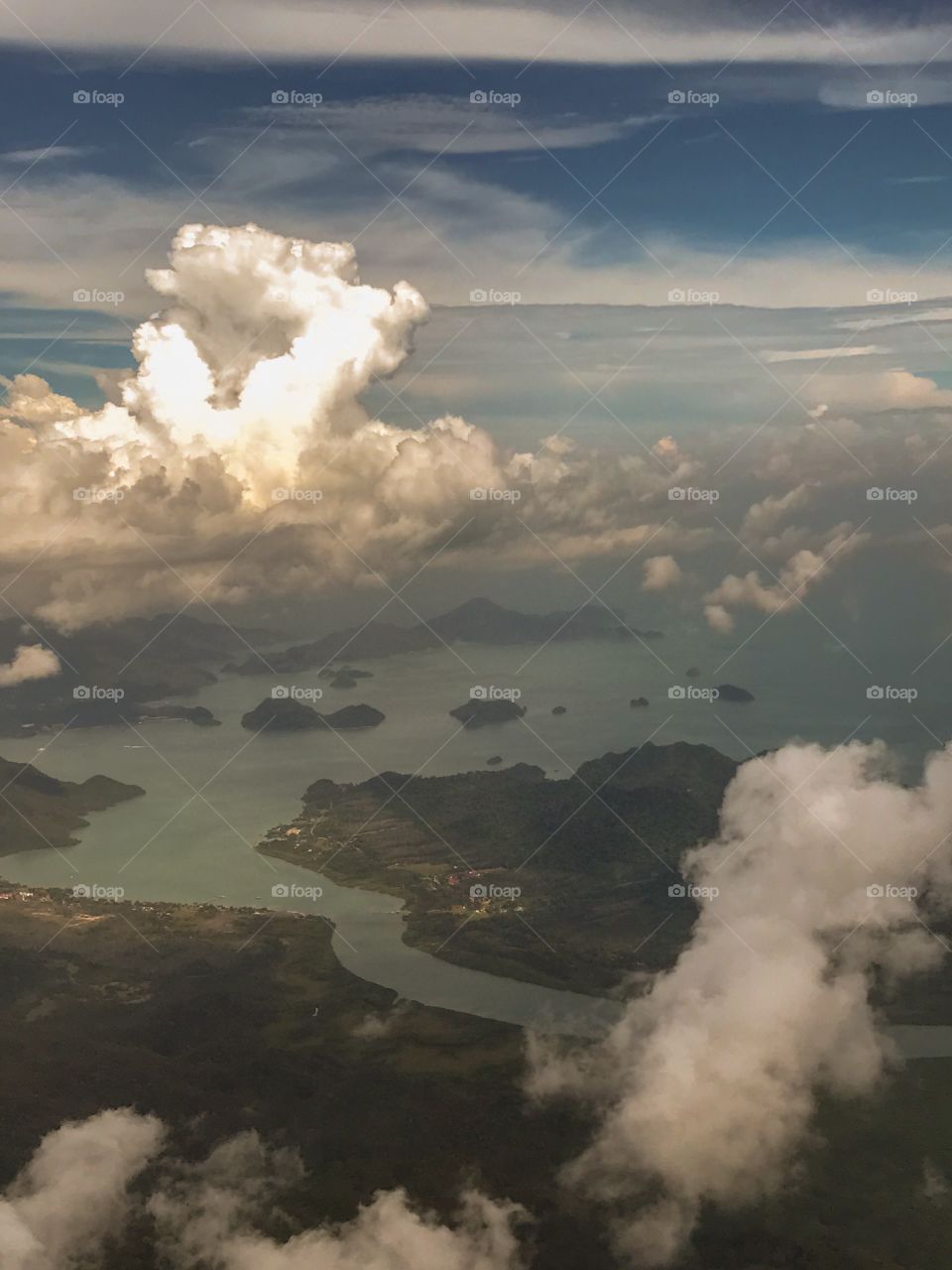 Fluffy clouds over Langkawi island ...