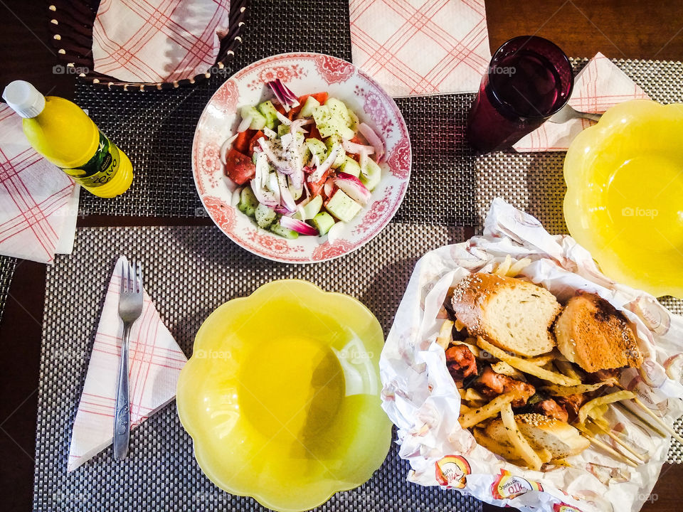 greek salad, fries and souvlakis