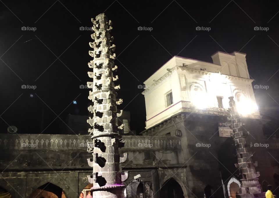 Ancient Indian Beautiful Temple's photo captured at night,  Stone carving, detailing can be seen and true example of classical Indian artisans work