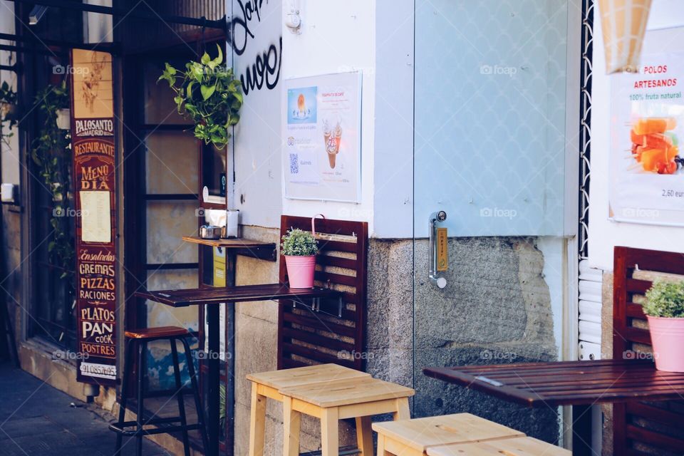 Pretty decorated  entrance to a cafe 
