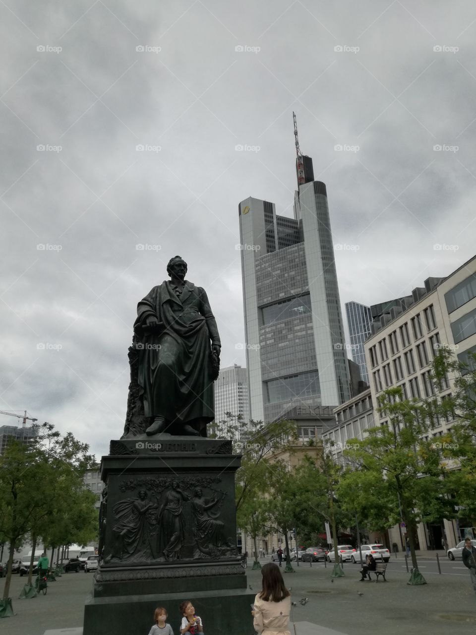 goethe statue and skyscraper