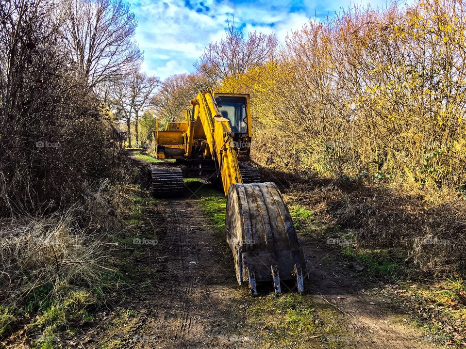 View of excavator on path