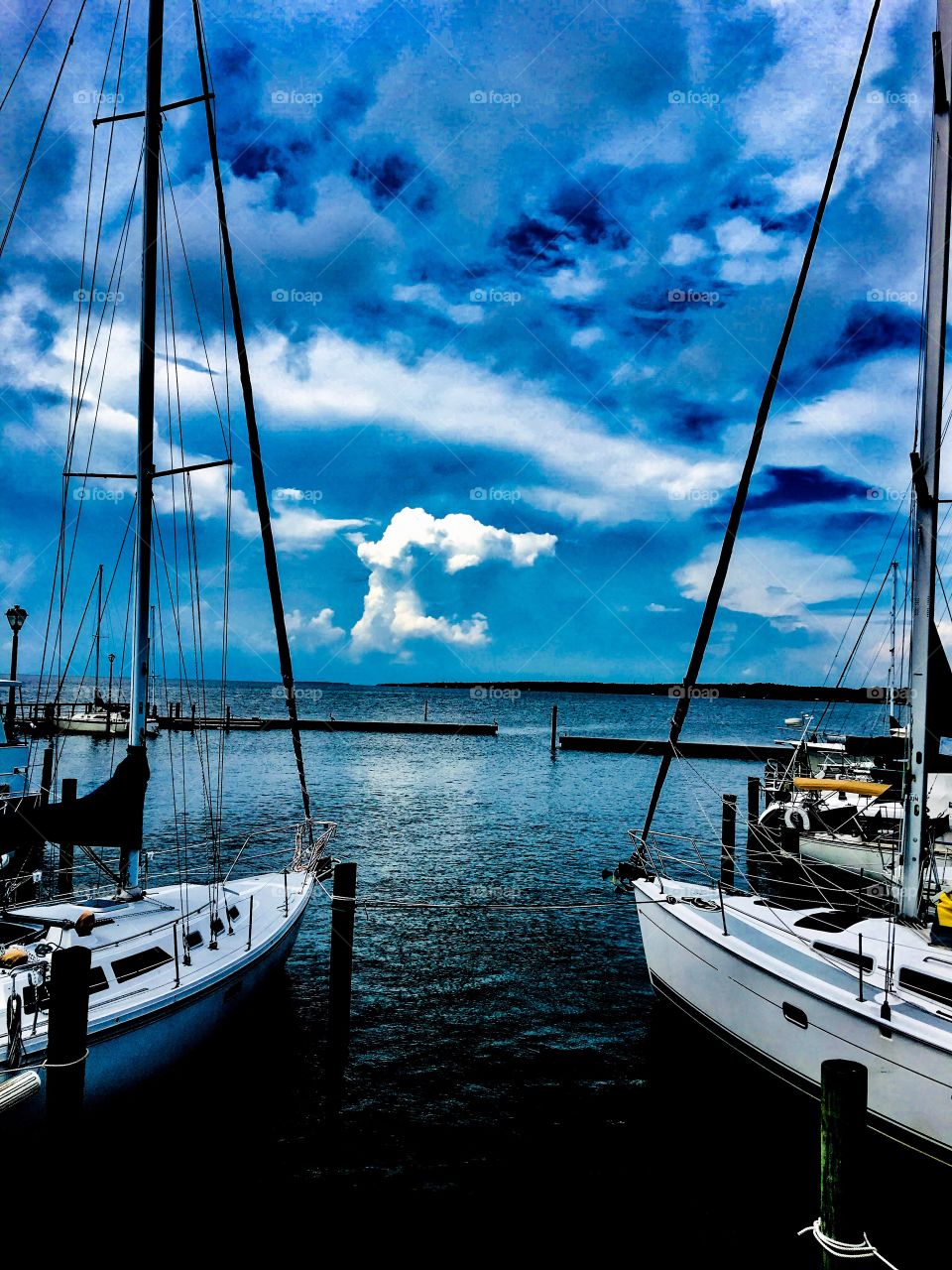 Sailboats ready to sail out into the water