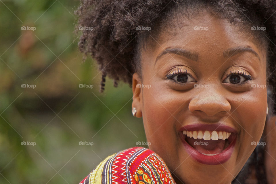 Beautiful adult African American woman happy , smiling in celebration of Nigerian Independence Day