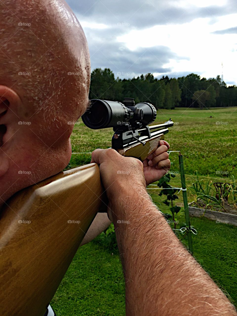 Peeping in the rifles binoculars! 