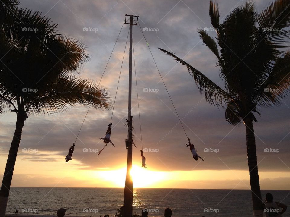 Puerto Vallarta Voladores early launch with coconut trees